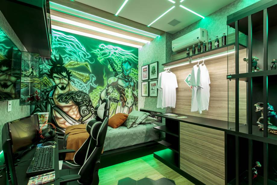 CASACOR BA: Quarto do Adolescente - Dinah Lins. Com estilo urbano explícito nos tons de cinza e no grafite nas paredes o ambiente é prático e moderno para um adolescente antenado. Computadores de última geração, luz e automação completam a atmosfera tecnológica do espaço.